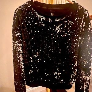 Black sweater is good condition like new